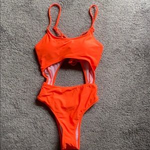 Bright orange one piece
